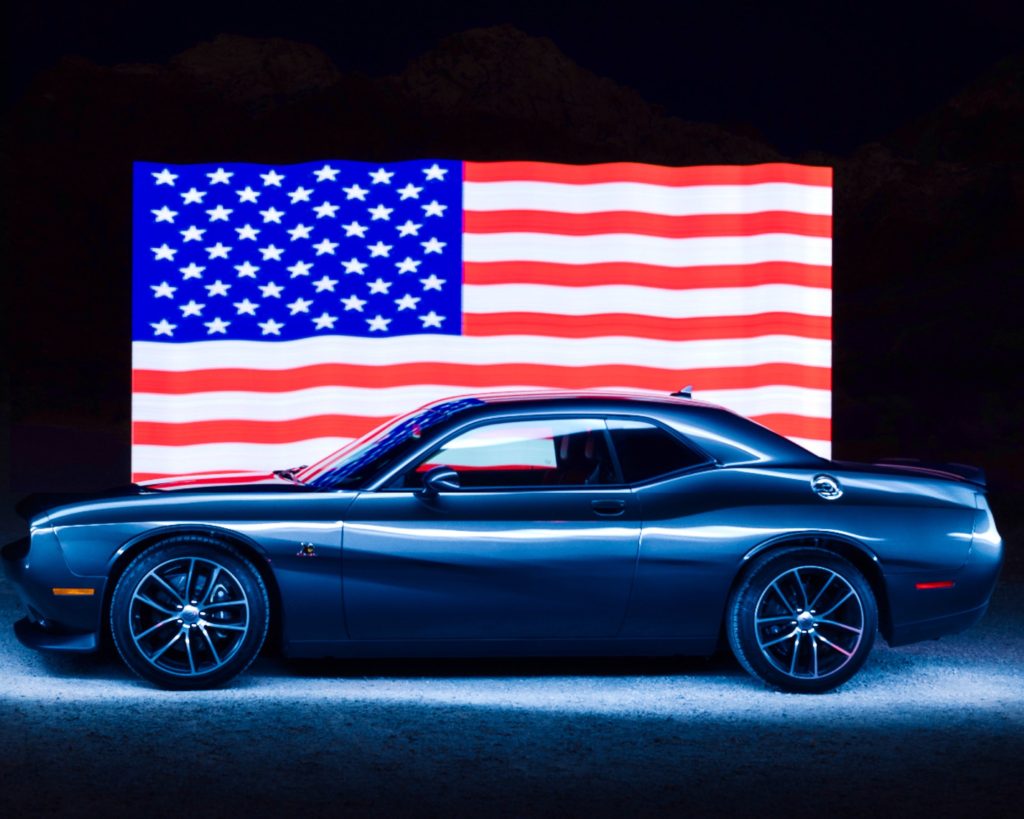 cool dramatic light painted charger with american flag background