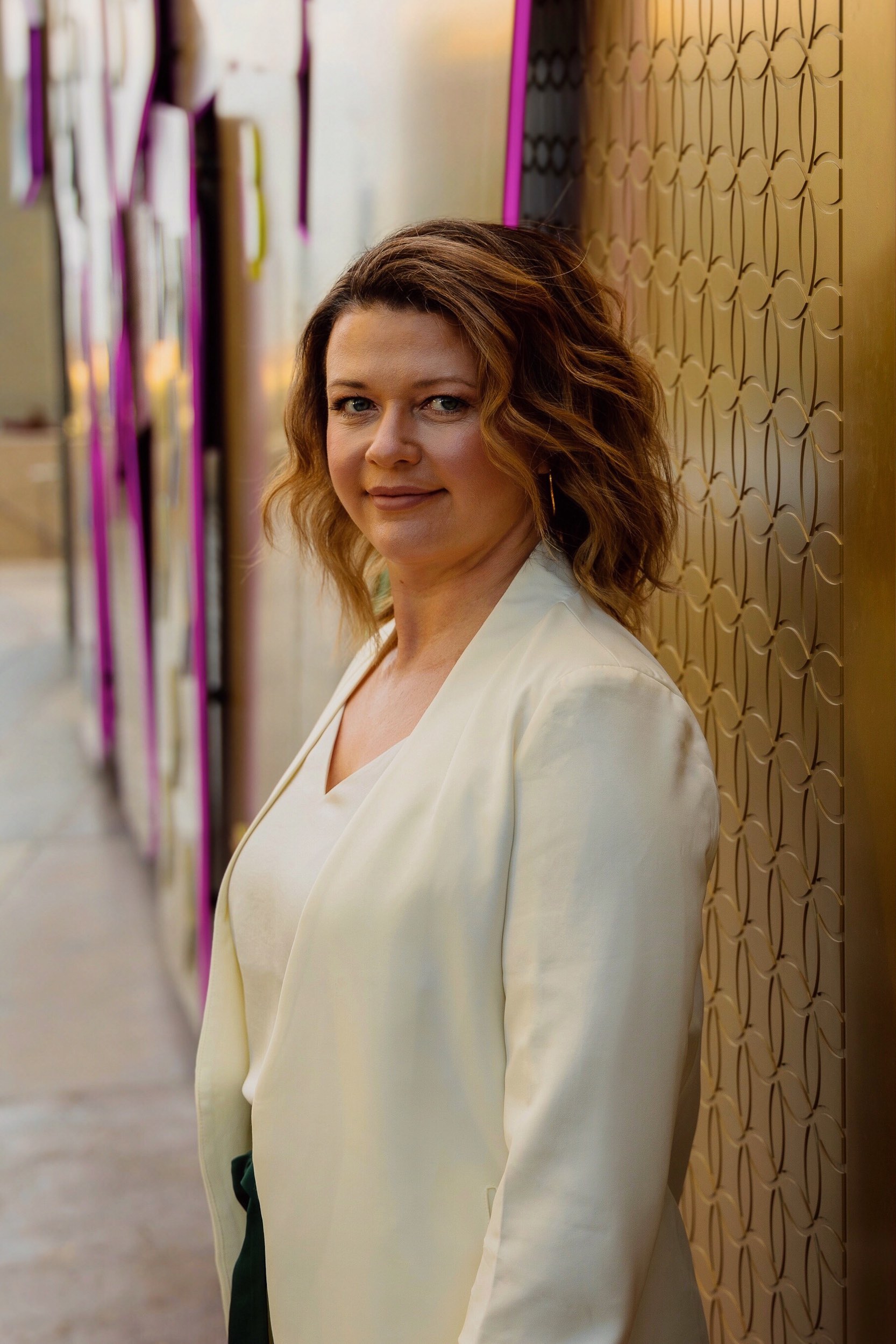 corporate headshot of woman in white las vegas