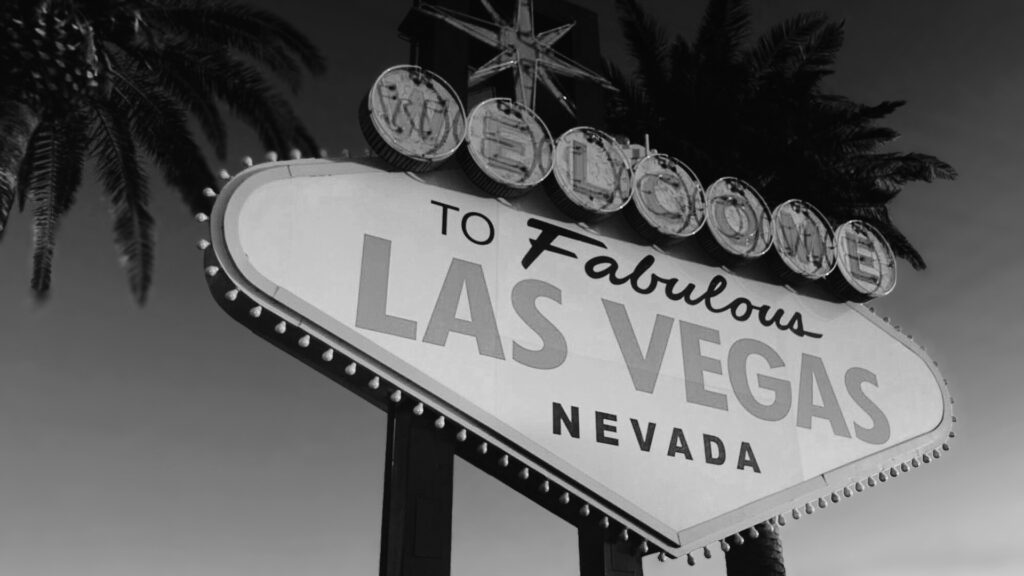 Black & white photo of the Welcome to Las Vegas sign
