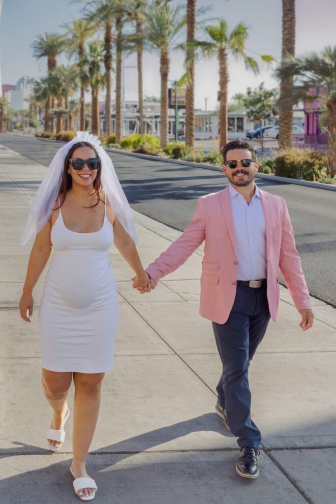 Happy Newlyweds Strolling in Downtown Las Vegas