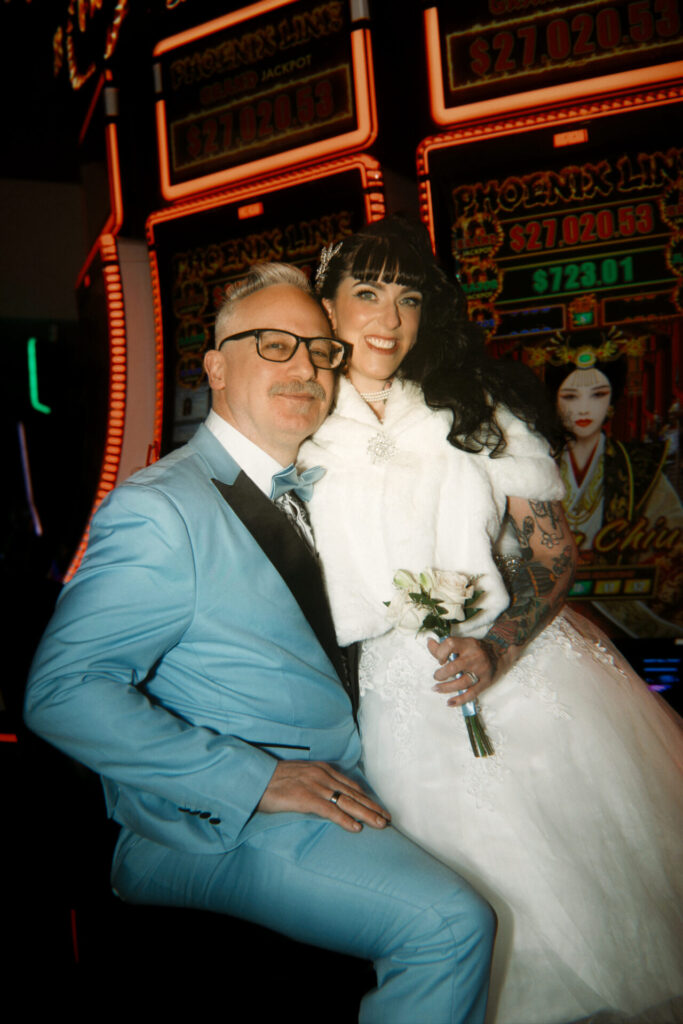 Newlyweds Celebrating at Casino Slot Machines